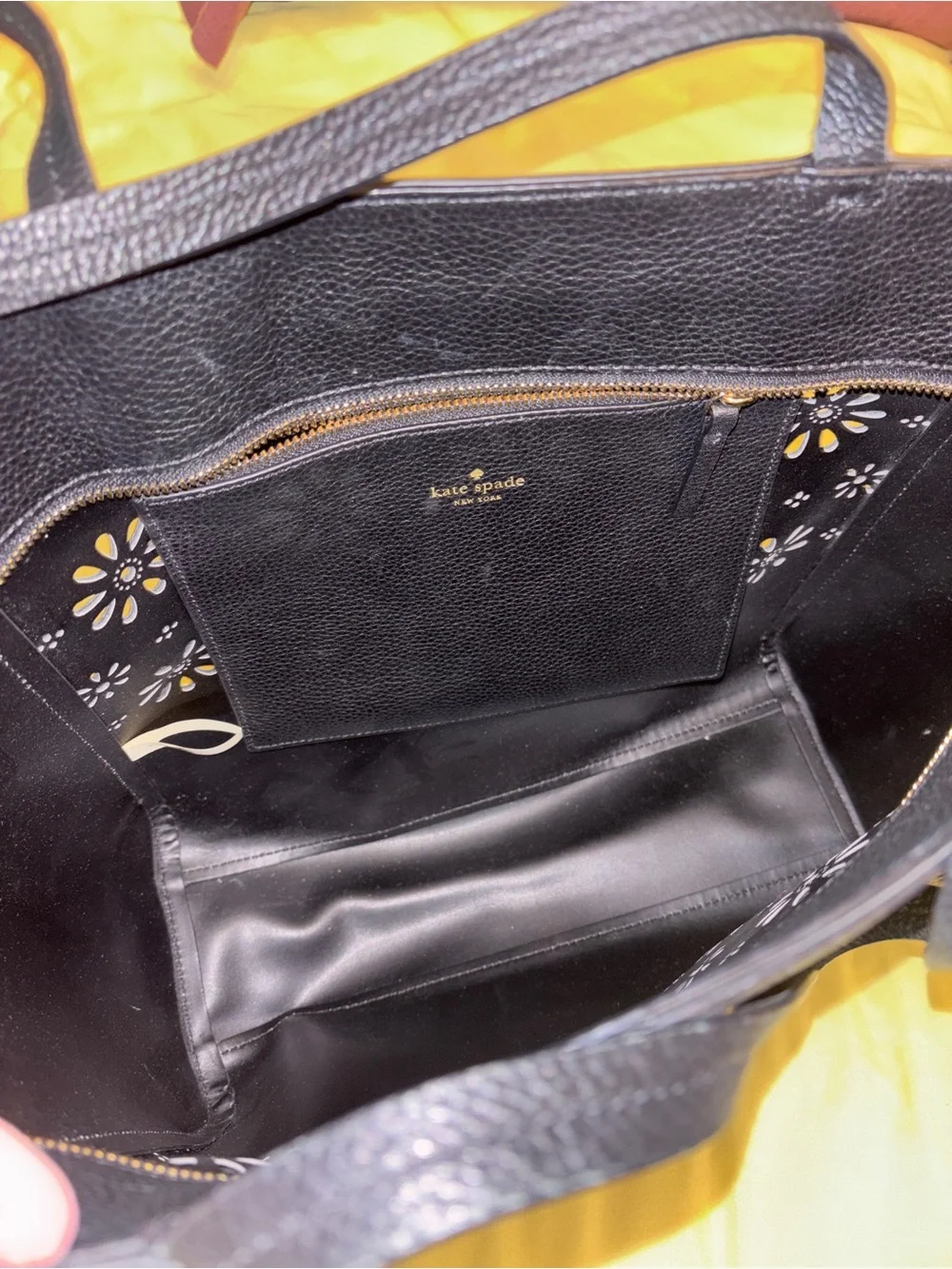 kate spade black leather tote with floral cutouts